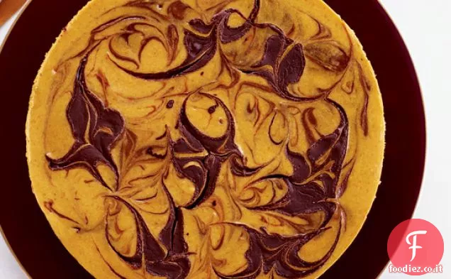 Cheesecake di zucca marmorizzata con crosta di brownie