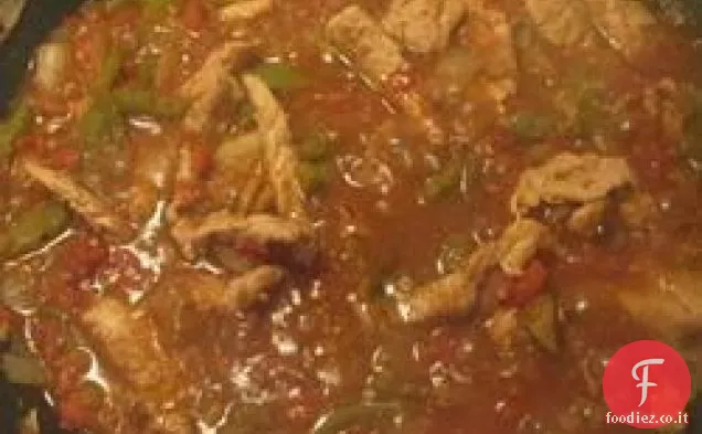 Filetto di maiale con salsa di pomodoro e pepe