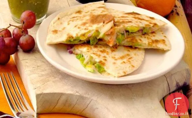 Quesadillas di fiori di zucca profumati all'arancia