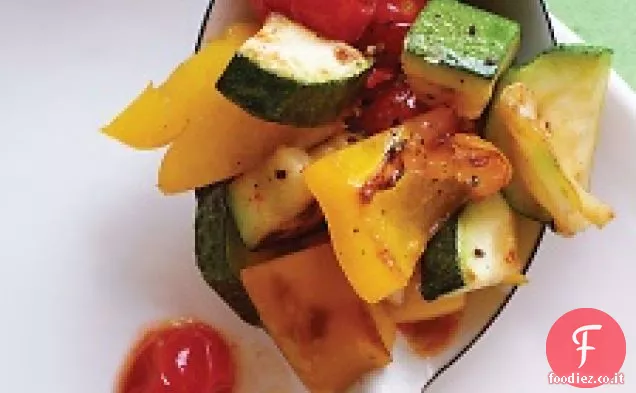 Zucchine saltate, peperoni e pomodori