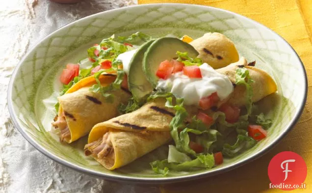 Carne di maiale alla griglia e tacos di papaya