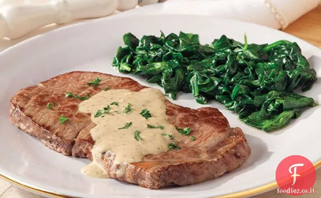 Bistecca con salsa di formaggio blu brandita