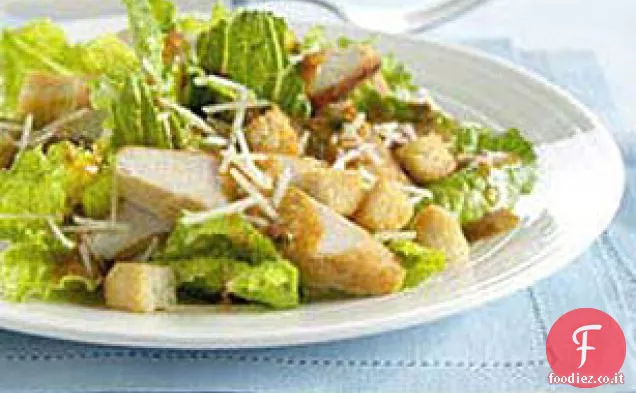 Insalata Caesar di pollo alla griglia con salsa piccante Chipotle