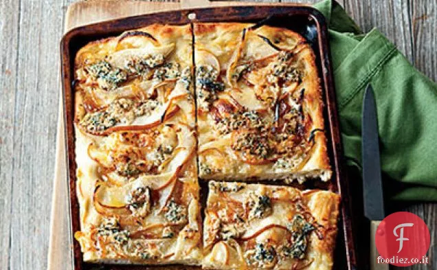 Dentice rosso in foglie di vite con burro di aglio e cappero