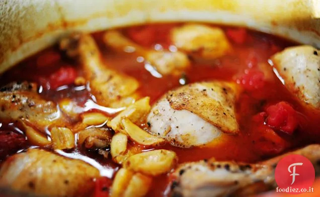 Pollo con pomodori e aglio