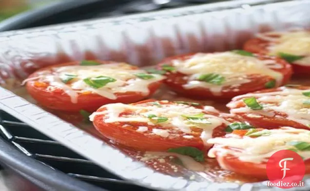 Pomodori alla griglia conditi con formaggio