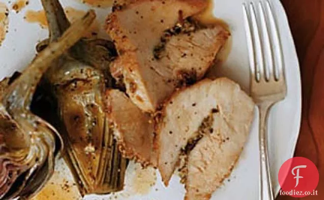 Maiale in crosta di finocchio con carciofi arrostiti