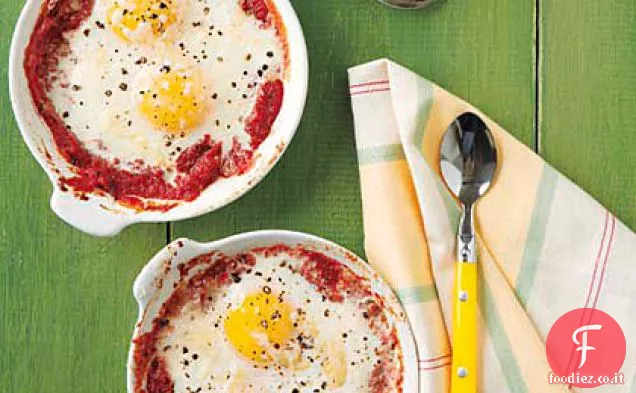 Uova al forno con pomodori e parmigiano