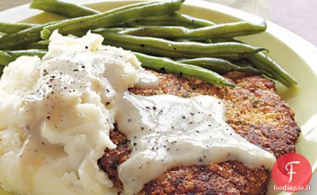 Bistecca di pollo fritto con sugo di latte di soia