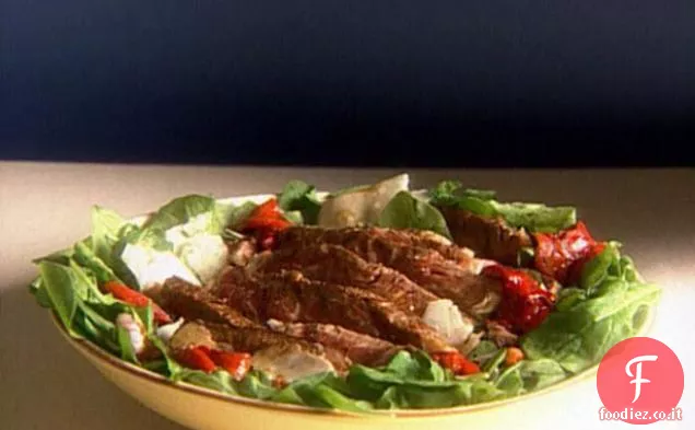 Costata scottata con rucola e insalata di peperoni arrostiti