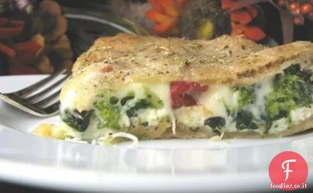 Torta di pizza con spinaci e broccoli ripieni di ricotta