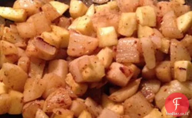 Zucca gialla fritta con patate e cipolle