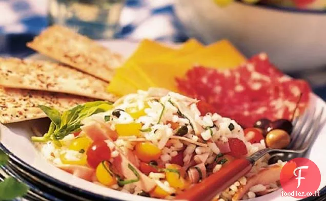 Insalata di riso con prosciutto e pomodori