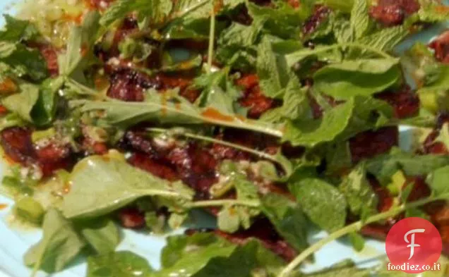Costolette marinate con scalogno alla griglia e insalata di menta