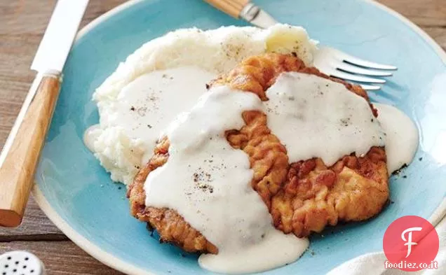 Bistecca di pollo fritto con sugo
