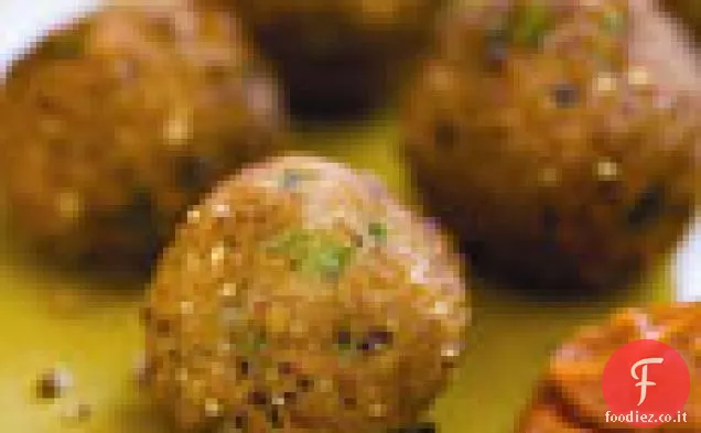 Frittelle di piselli dagli occhi neri con salsa di peperoncino piccante