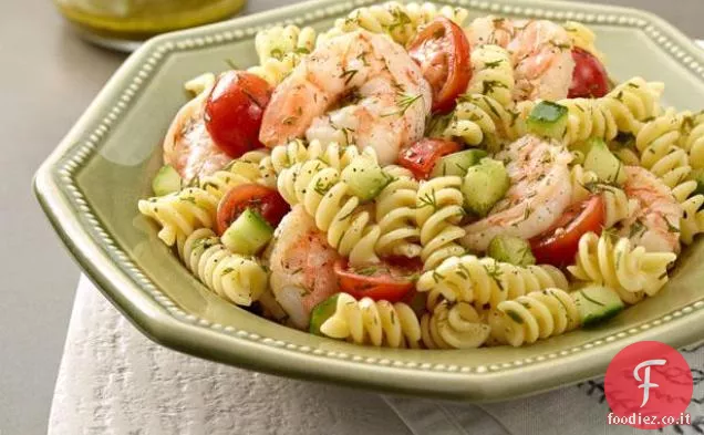 Insalata di pasta con gamberetti in camicia e condimento al limone e aneto