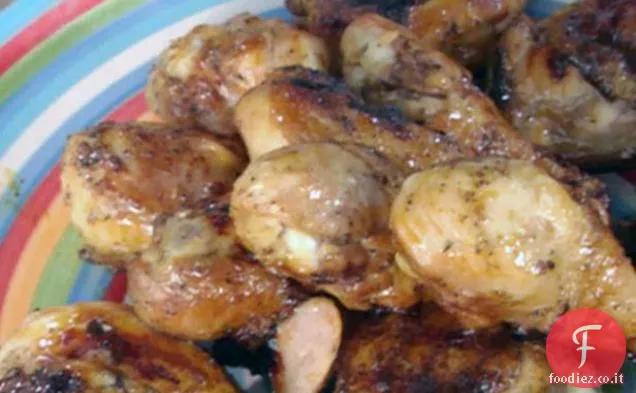 Cosce e bacchette di pollo smaltate di mandarino-acero