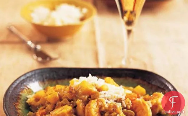 Curry di gamberi e mele con uvetta dorata