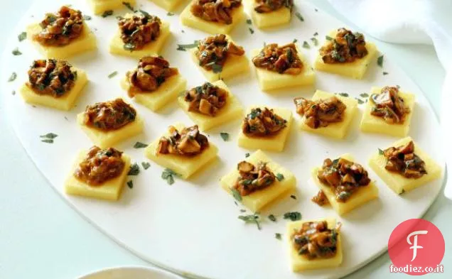 Quadrati di polenta con Ragù di funghi