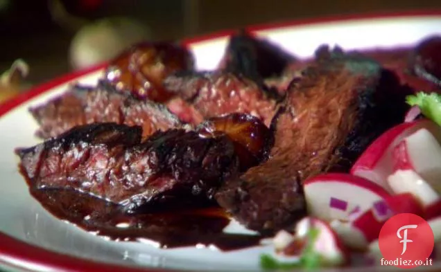 Bistecca al Vino Rosso e Melograno con Cipollini