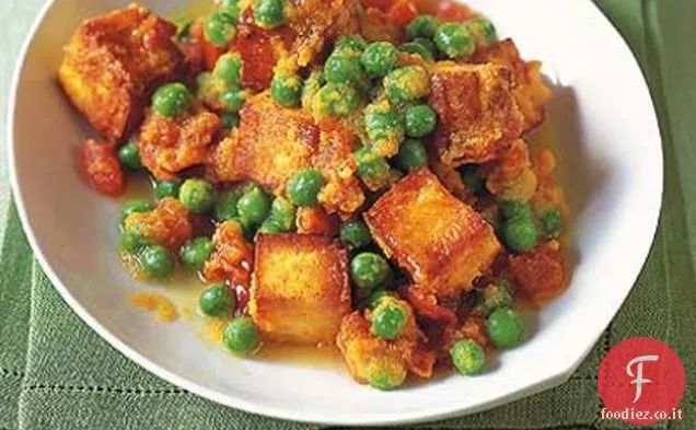 Curry di piselli e pomodori