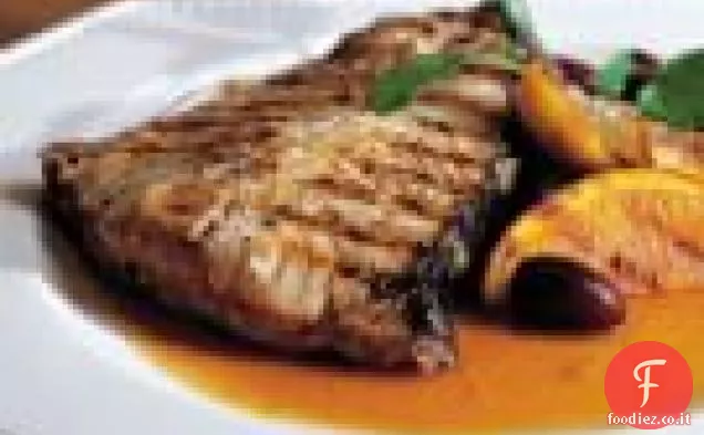 Bistecche di Halibut con agrumi, crescione e olive nere