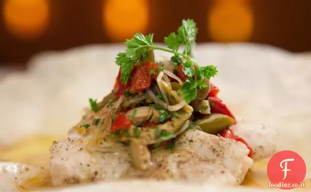 Cernia al vapore in pergamena con salsa di arancia acida e gusto Martini