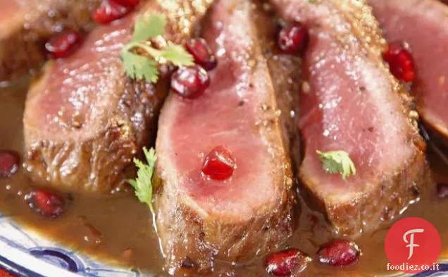 Agnello arrosto con salsa di melograno e tamarindo