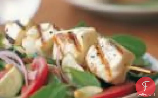 Spiedini di halibut con insalata di rucola