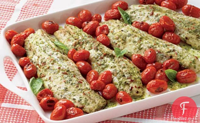 Pesto-Spigola a strisce marinate con pomodori caldi