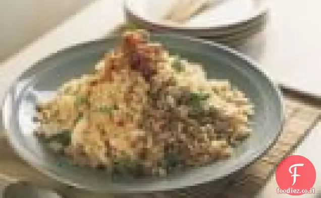 Riso fritto al peperoncino con granchio e basilico tailandese
