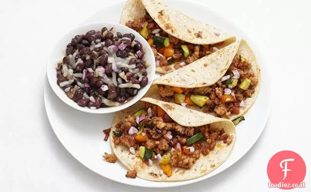 Tacos di maiale con fagioli neri