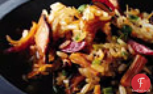 Riso appiccicoso con salsiccia cinese e capesante essiccate