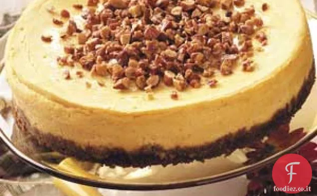 Cheesecake di zucca al cioccolato bianco con guarnizione di mandorle