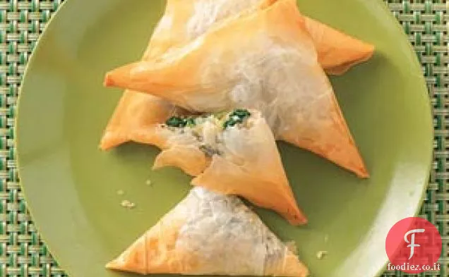 Triangoli di formaggio spinaci