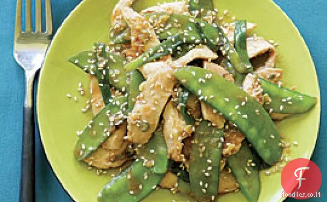 Pollo al sesamo con zenzero e piselli