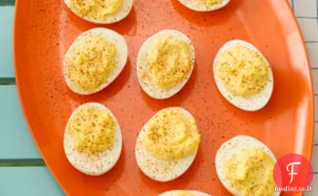 Uova alla diavola alle erbe cremose