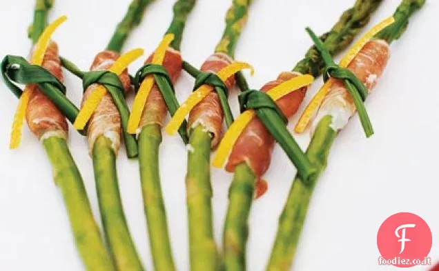 Asparagi avvolti in prosciutto con salsa agli agrumi