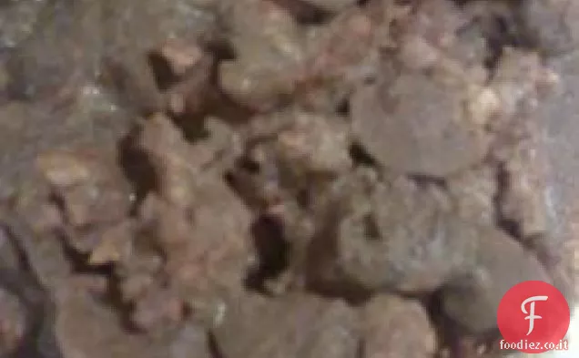 Salsiccia affumicata in sugo di vino ai funghi