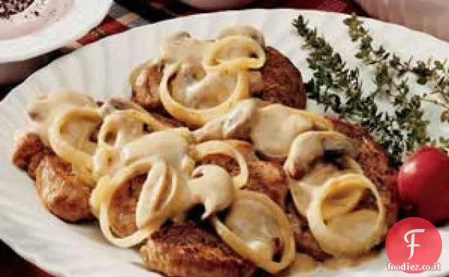 Maiale con salsa di funghi