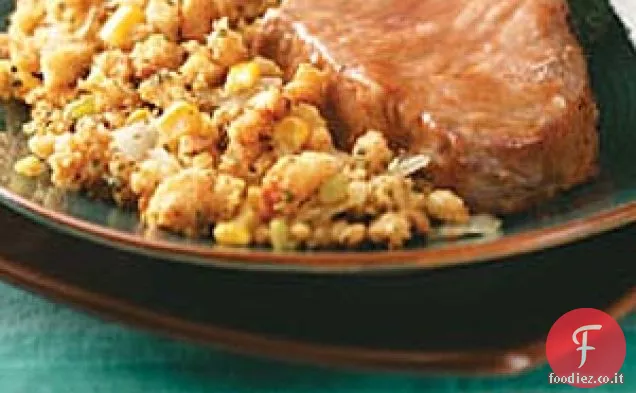 Braciole di maiale smaltate con condimento di pane di mais