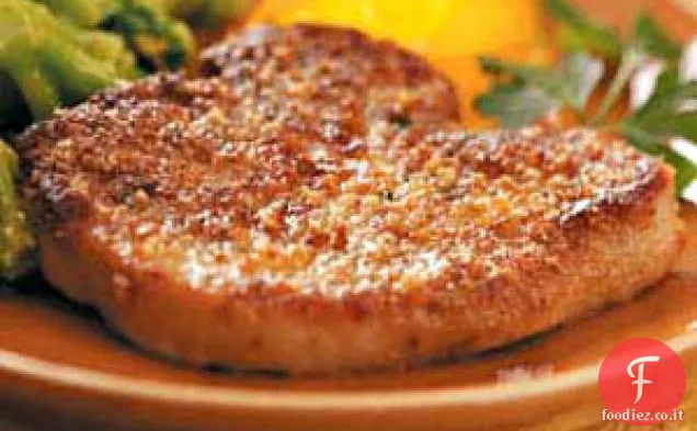 Braciole di maiale croccanti ricoperte di erbe