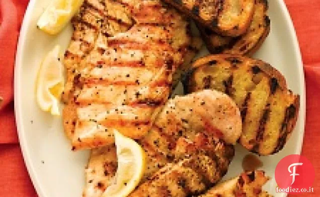 Pollo al limone alla griglia con pane all'aglio