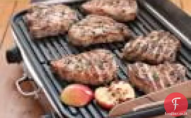 Braciole di maiale alle erbe con salsa di mele