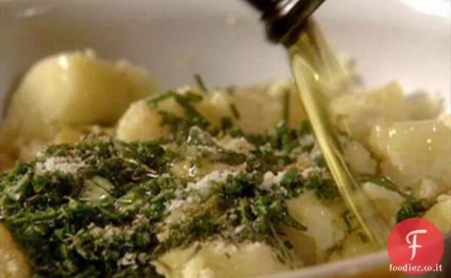 Patate schiacciate all'olio di limone