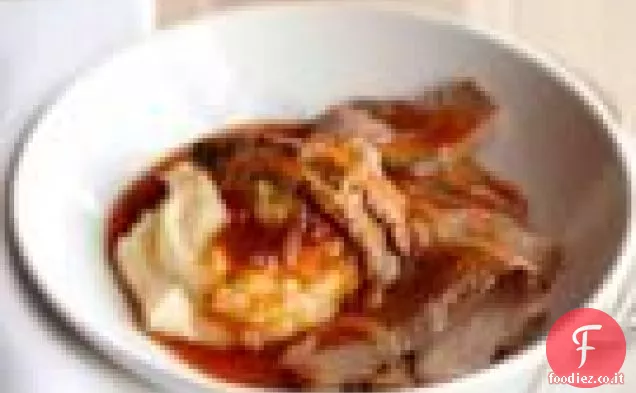 Petto brasato con salsa di birra e cipolla