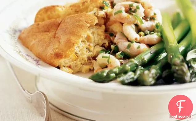 Soufflé di mais e pomodoro secco con salsa di gamberetti e cipolla