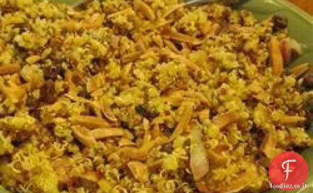Quinoa agli agrumi al curry con uvetta e mandorle tostate