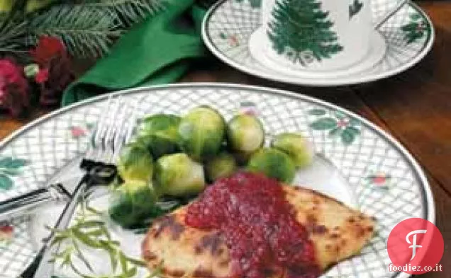 Cotolette di tacchino con mirtilli rossi e arancia